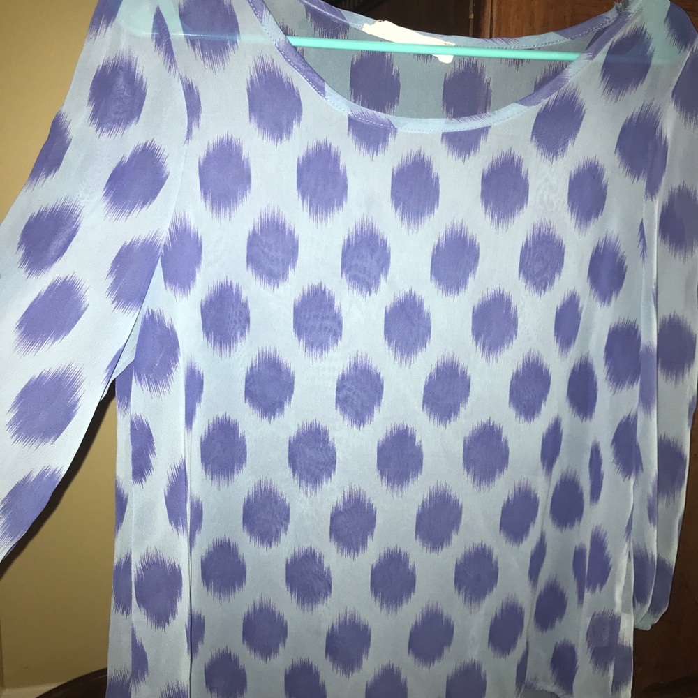 Peace, love cream, sheer top. Very cute.
